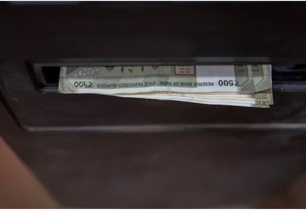 Rupee slips as corporate dollar bids eclipse uptick in Asian peers